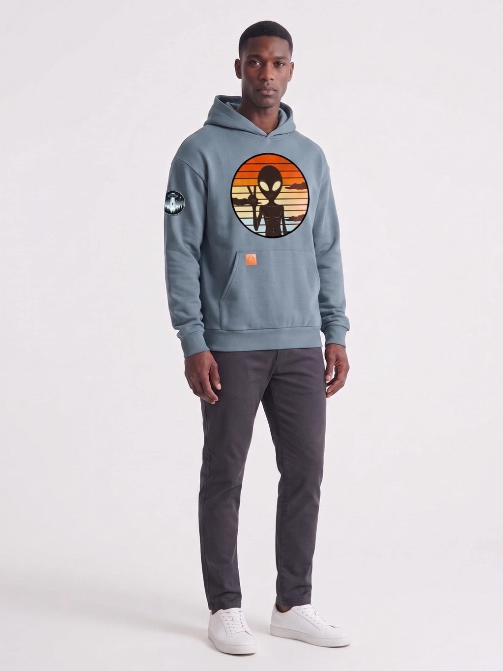 Light blue hoodie with alien graphic print, hood, and front kangaroo pocket