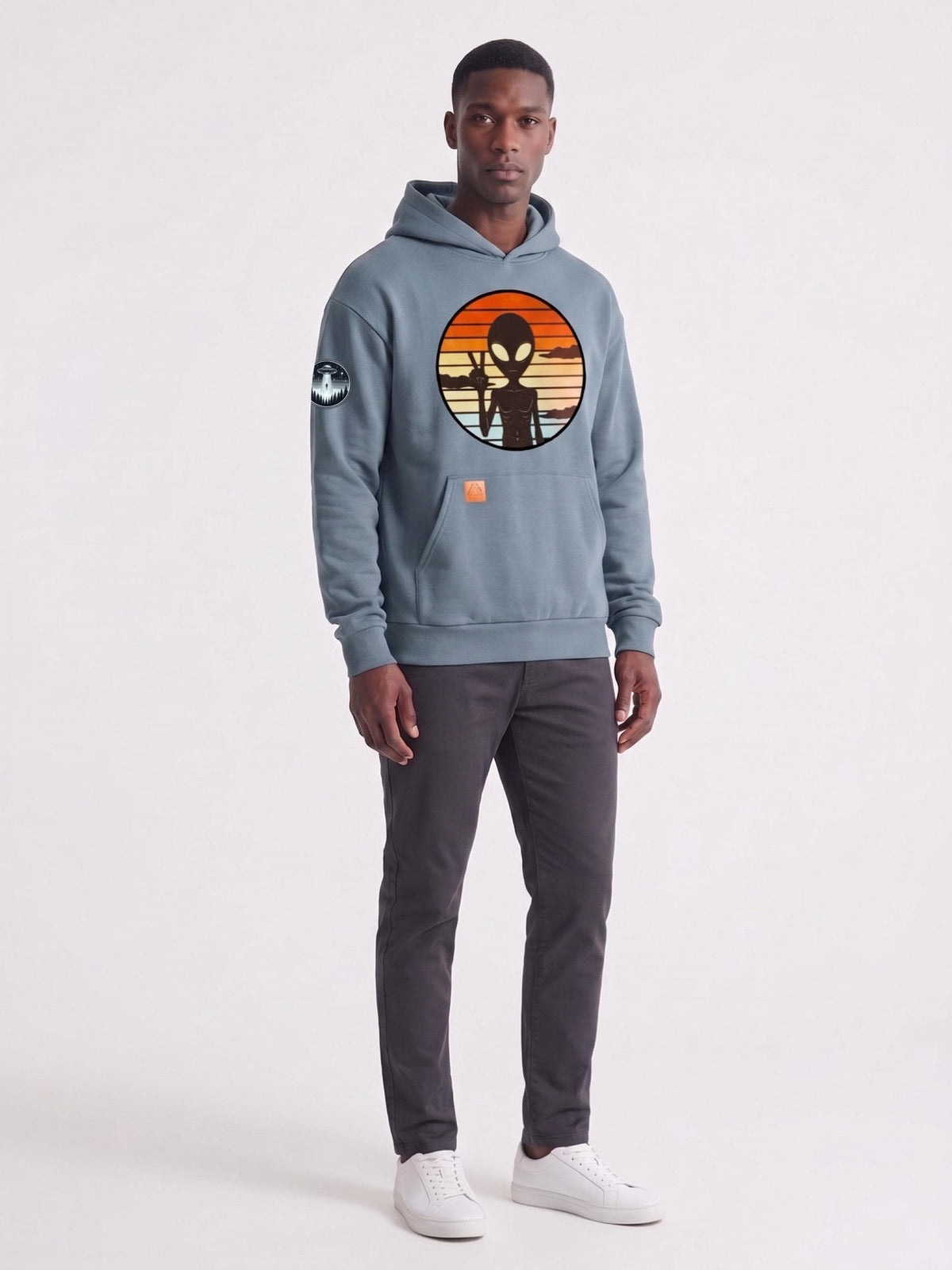 Light blue hoodie with alien graphic print, hood, and front kangaroo pocket