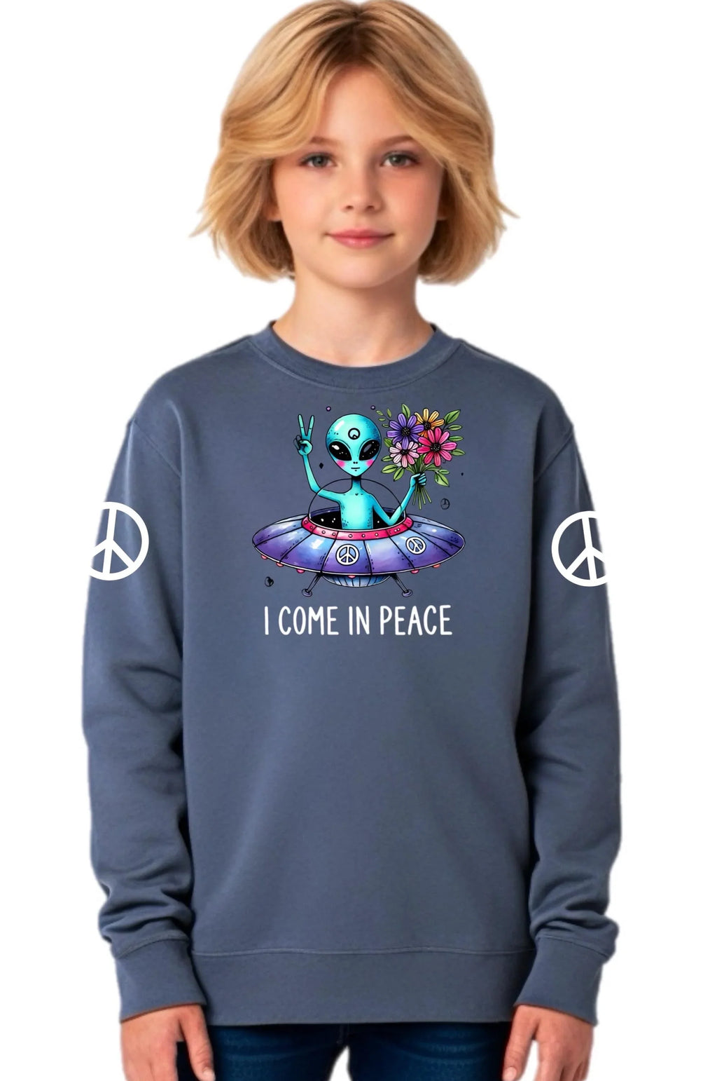 Child wearing a blue youth alien sweatshirt with a UFO graphic and peace signs.