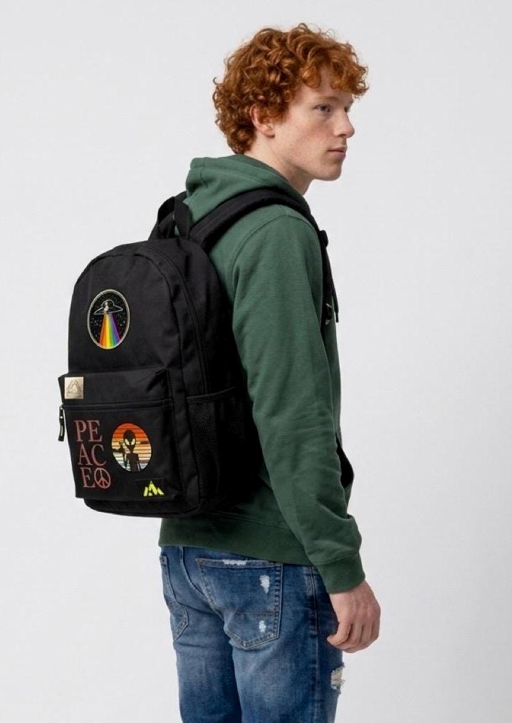 Black backpack with alien graphic front pocket and adjustable shoulder straps