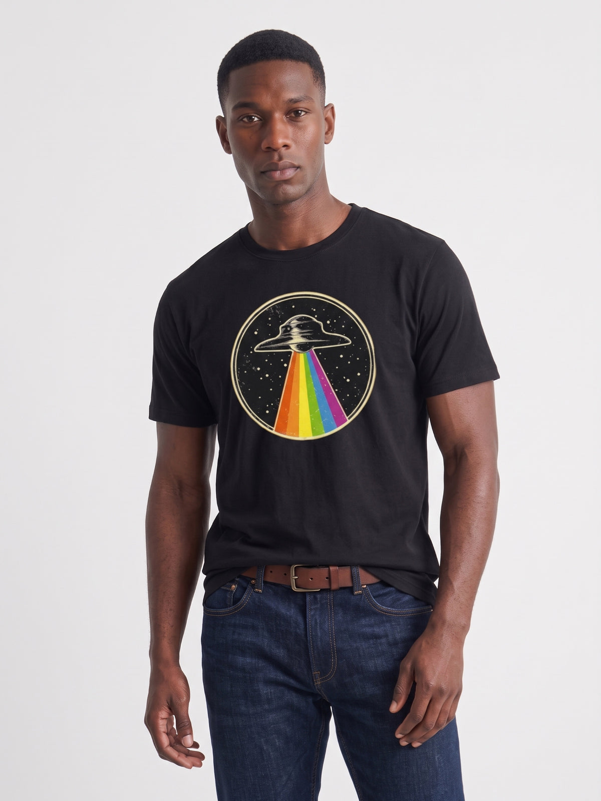 Black unisex T-shirt with UFO rainbow graphic and orange sleeve tag