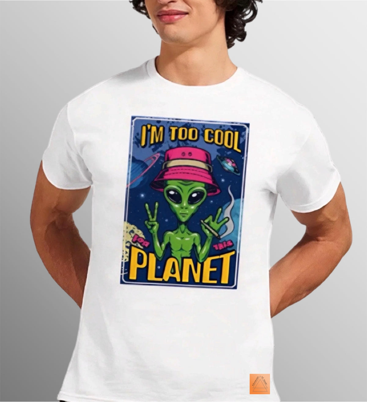 T-shirt with a colorful graphic print of a green alien in a pink hat making peace signs, with the text 'I'M TOO COOL FOR THE PLANET'.