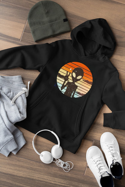 Adult hoodie featuring a colorful alien art print from Elements Of Basic, displayed on a mannequin against a neutral background.