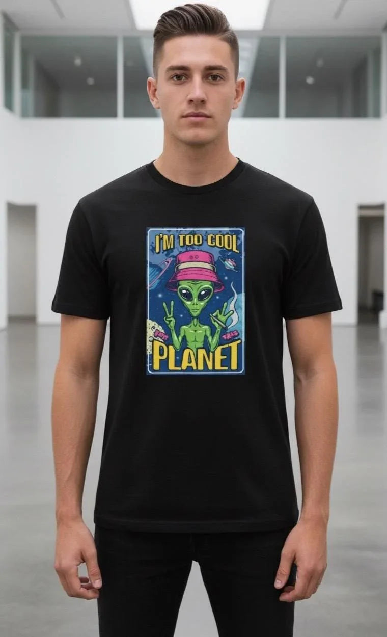Man wearing a black unisex crewneck t-shirt with a colorful alien graphic print.