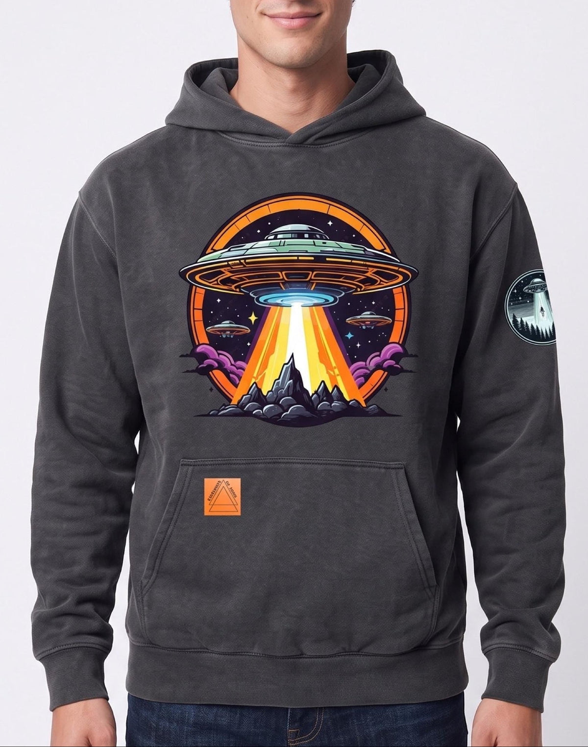 Hooded sweatshirt with a colorful retro sci-fi graphic of a flying saucer and mountain landscape on the chest