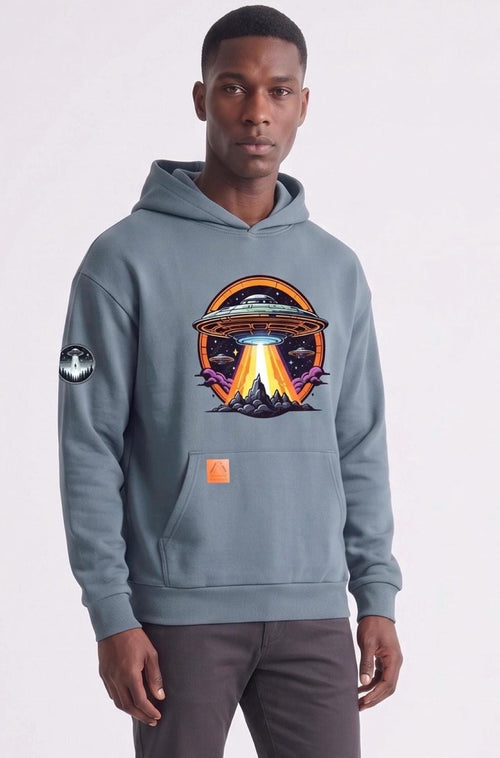 slate blue-gray pullover hoodie with a colorful retro sci-fi graphic of a UFO and mountain landscape .
